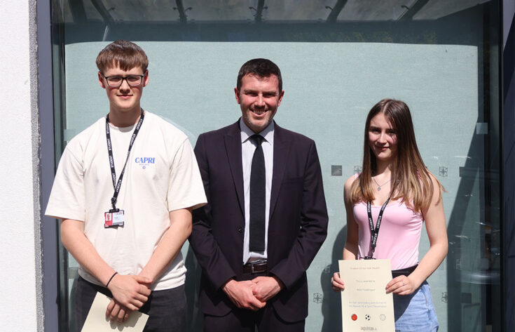 Photograph of students receiving their awards