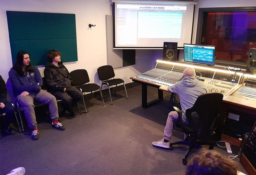 Photograph of students watching a demonstration Spirit Studios